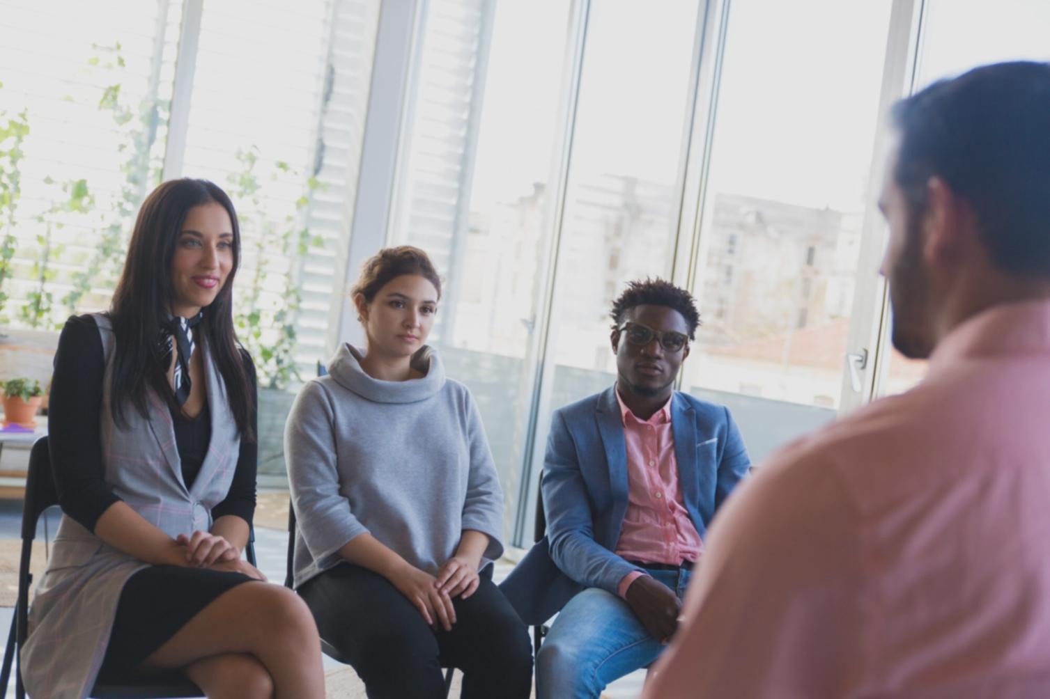 Financial documents and planning materials spread on desk during consultation